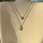 [Clover Jewelry] Dämonenauge Hamsa-Hand-Halskette