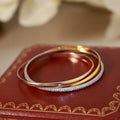 [Clover Jewelry]TRINITY DREIFARBIGES GOLD DREI-RING-ARMBAND
